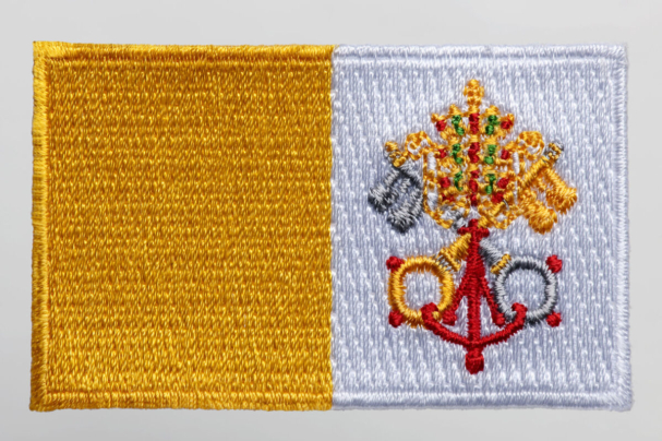 Flag patch of the Vatican City State on a white background.