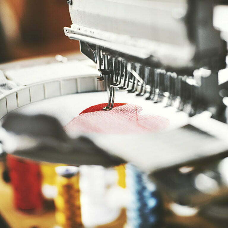 Embroidery machine put into work of making heart shaped pattern.